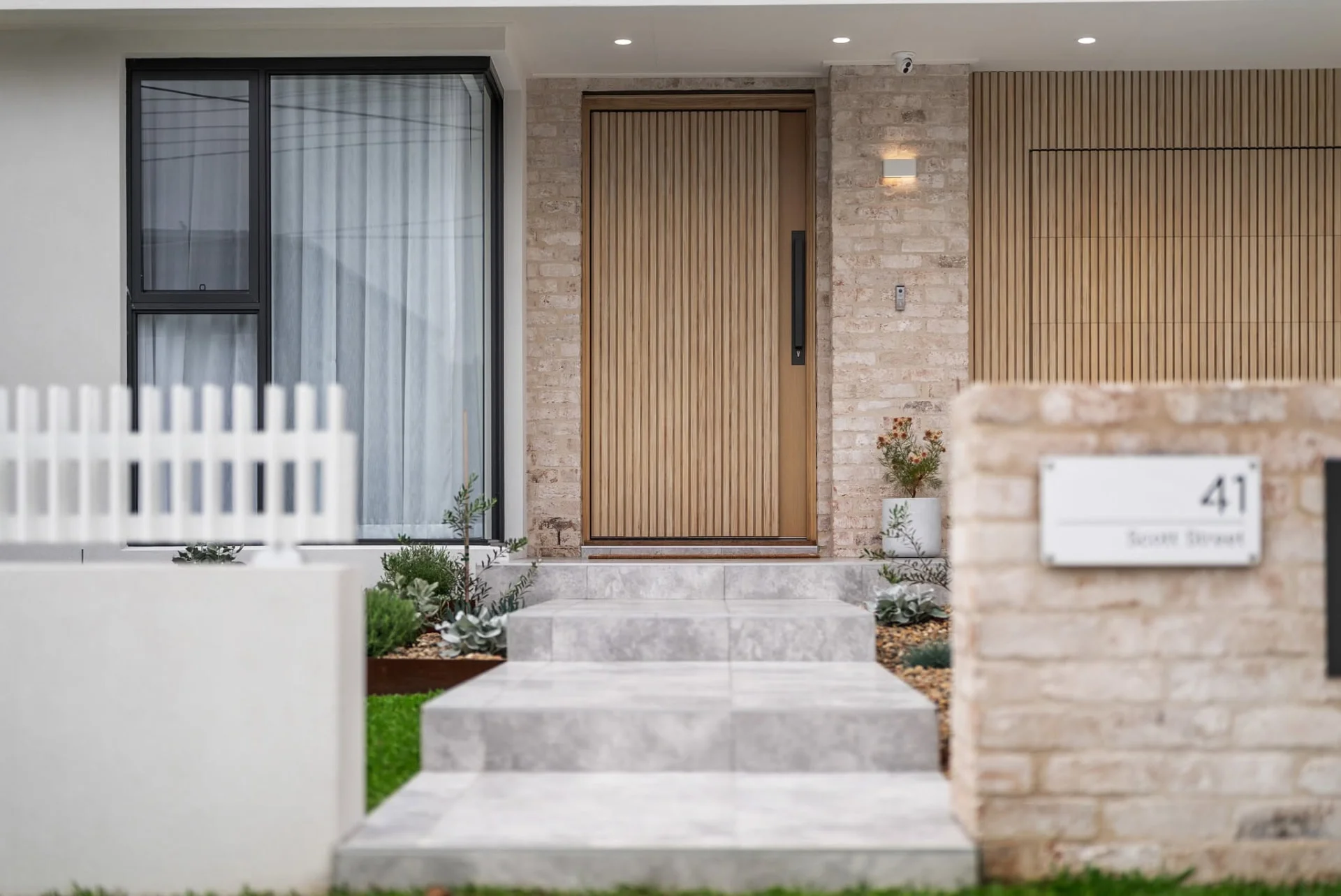 Facade of a completed Bayview custom home at dusk in Sydney